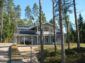 Отель Lomapesä Cottages  Пертунмаа